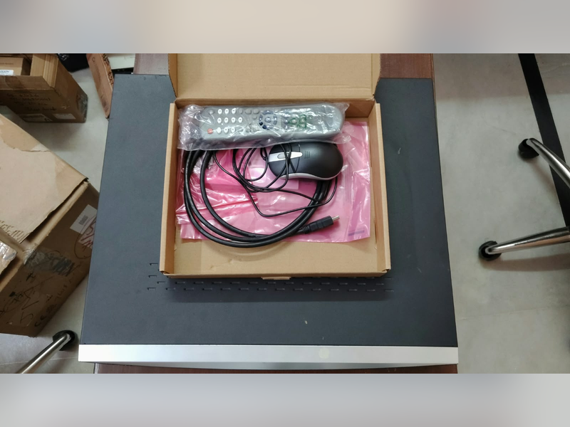 Click to enlarge Hikvision DS-7732NXI-K4 NVR with 2 x 4 TB WD Purple Drives, top, with remote, mouse and cables